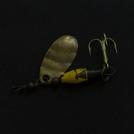 Spinner Glen Evans Shyster, messing, 4 g, offset oog, #24738