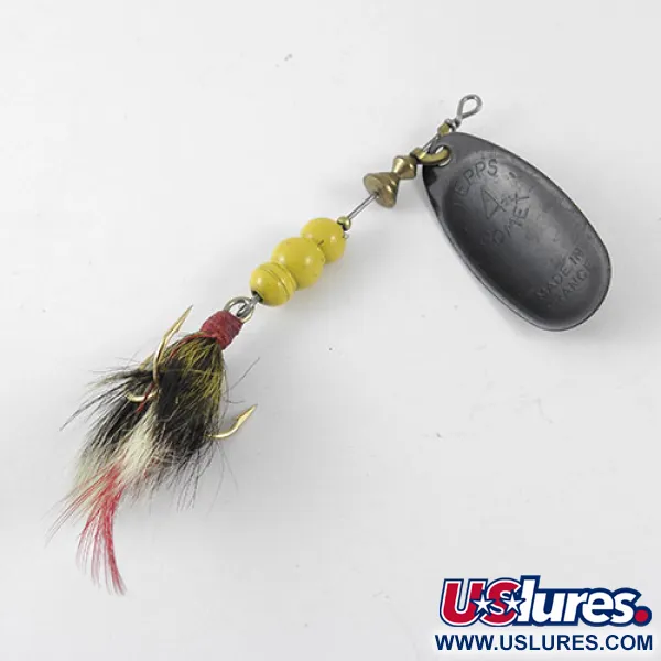 Mepps Black Fury 4 Dressed Spinner, Geel / Zwart, 9g, Geveerde dreg, #1089